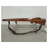 30 in wooden gun stock with leather strap,