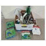 Box filled with contractor plumbing supplies.