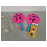 Set of Franklin paddle ball rackets and four