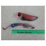 4 inch knife with wooden handle and leather sheath