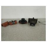 Two old cameras and a Canon carrying case, One