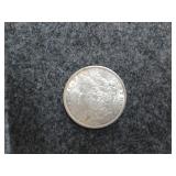 1884 Morgan silver dollar