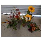 Five assorted flower arrangements