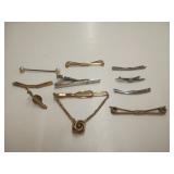 Assorted pins and tie clips