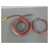 Two coils of copper tubing, half inch tube is 10