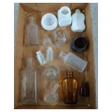 Collection of old small glass bottles / jars, a