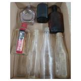 Collection of glass bottles, includes one