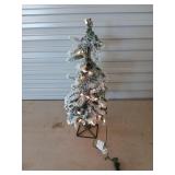 25 inch pre-lit pre-flocked Christmas tree, works