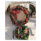 Two Christmas wreaths with hangers, one is 36