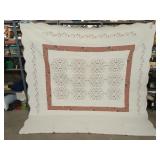 Beautiful white pink quilt with embroidered