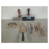 Assorted trowels, grout floaters, taping knives,