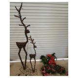 Two Christmas swags, one needs new batteries,