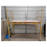 Yellow Werner scaffolding, 75x29x74 in
