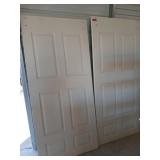 Two white wooden doors, 80x36 in, interior, for