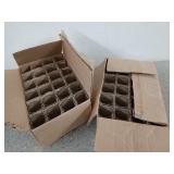 Two boxes, one is partially full, of super sham