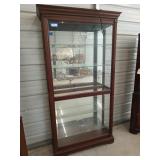 Lighted china cabinet with sliding door and four
