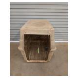 Large plastic dog kennel, 28x26x37 in