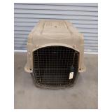 Large plastic dog kennel, two-toned, 30x25x31 in