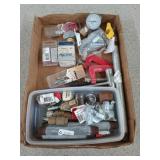 Assorted pipe fittings, hardware, an orbit