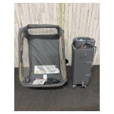 grey portable playard or baby bassinet