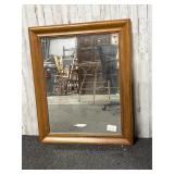 rectangular wooden-framed mirror