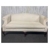Vintage beige upholstered sofa