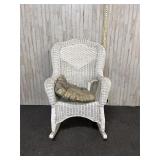 White wicker rocking chair