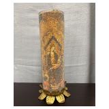 Religion candle on pedestal