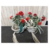 Hanging planter with artificial flowers