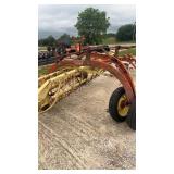New holland 256 bar rake with dolly wheels good