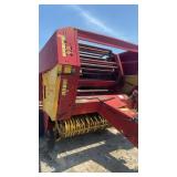 New Holland 855 bar roller has monitor and 540