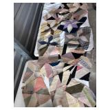 17 completed quilt flower toppers