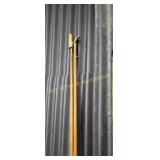 flag poles, one has eagle, one has a  ear of corn