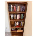 Wooden Bookshelf w/ a Large Assortment of Books