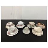 Set of Seven Decorative Porcelain Cup and...