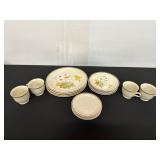 Dinnerware Set Featuring Floral Design with...