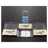 Set of Aircraft-Themed Metal Pins in Display Cases