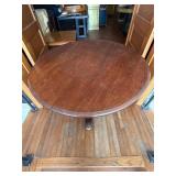 Round Wooden Pedestal Dining Table