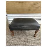 Black Upholstered Footstool with Wooden Legs