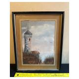 Framed Lighthouse Artwork with Coastal Scenery