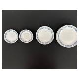 Set of White Dinnerware With Blue Floral Pattern