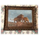 Painting of Lions in Ornate Frame