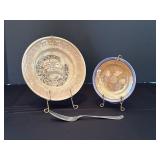 Two Decorative Plates and Ornate Fork Set