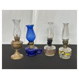 Four Decorative Oil Lamps