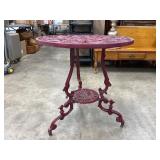 Red Cast Iron Round Accent Table