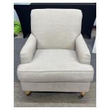 Upholstered Armchair With Casters