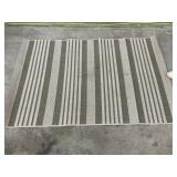 Striped Outdoor Rug With Neutral Tones