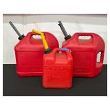 Set of Three Red Plastic Gas Cans