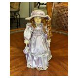 Porcelain Doll in Lavender Dress