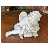 Reclining Angelic Figurine With Wings